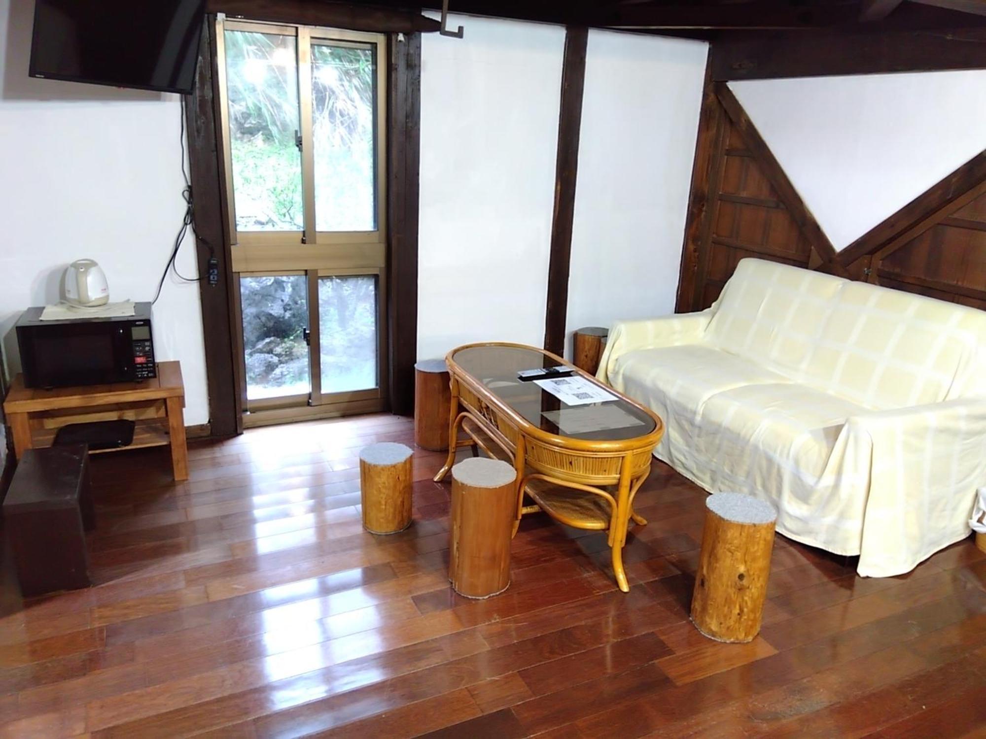Hotel Ｐｅｎｓｉｏｎ　Ｓｈｉｍａｋａｚｅ à Motobu Extérieur photo